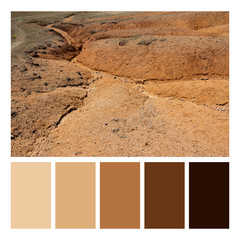 Albanian nature landscape. Sandy hills with rainwater sign on the ground in a colour palette, with complimentary colour swatches