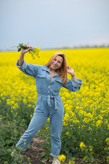 beautiful young woman on flower field