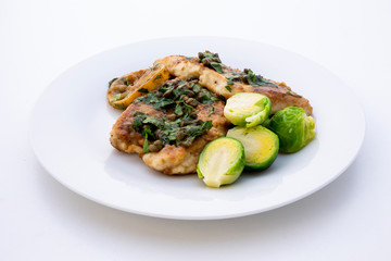 Greek lemon chicken and brussels sprouts with parsley