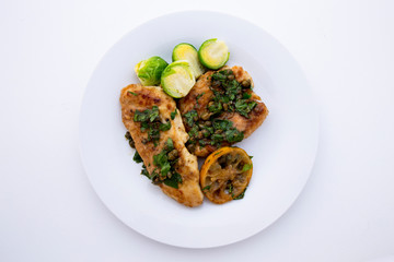 Greek lemon chicken and brussels sprouts with parsley