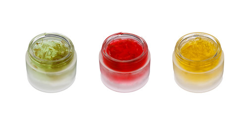 Collection of gel creams and containers for skincare with flower ingredients