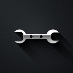 Silver Wrench spanner icon isolated on black background. Long shadow style. Vector Illustration