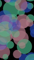 Multicolored translucent circles on a dark background. 3D illustration