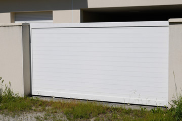 white door steel gate modern portal of suburb house garage door