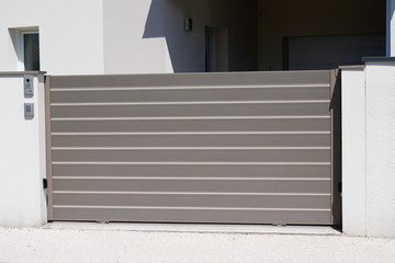 Aluminum modern brown gate home portal of suburb house