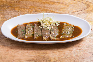 Tortellini pasta dish on white plate