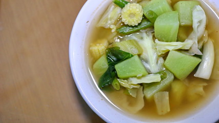 Traditional indonesian culinary food, sayur asam soup close up, which contain mix vagetables in tamarind clear soup