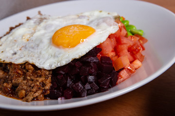 Korean bibimbop with egg on top.