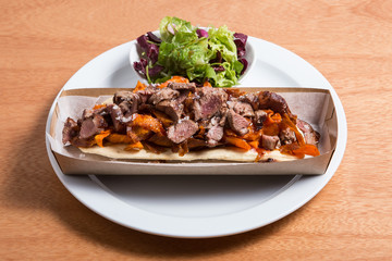 Toast with beef and vegetables