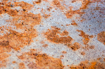 Rusty metal surface. Gray and orange.
