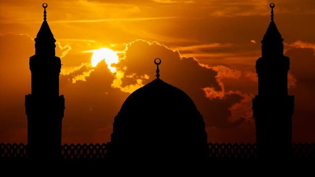 Mosque Qiblatain in Medina, Saudi Arabia: Time Lapse at Sunset with Red Sun and Fiery Clouds
