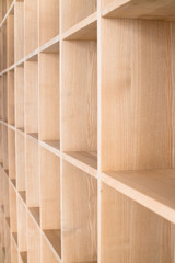 empty wooden shelf with boxes