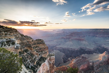 Fototapeta na wymiar Sunset on grand canyon with impressive sun zays