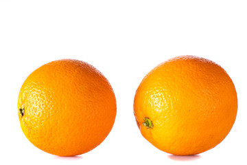 whole orange with drops of water on a white or black background
