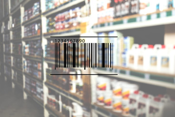 Barcode and blurred view of modern wholesale warehouse