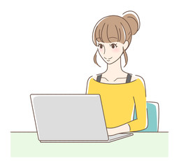 パソコンを操作して笑顔の女性