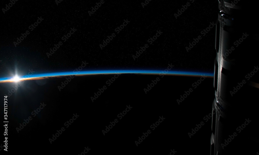 Wall mural view of planet earth horizon from a space station window during a sunrise 3d rendering elements of t