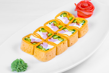 A sushi mexican roll on a plate