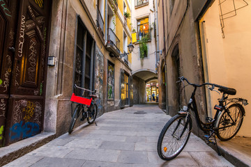 Fototapeta na wymiar Bikes for rent in a Gothic quarter, Barcelona, Spain. 