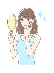 笑顔で手鏡を見る女性