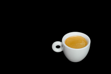 Espresso coffee cup isolated on black table at cafe or restaurant