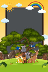 Fototapeta premium Border template design with many wild animals in background