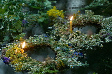 Wreathes witn candles on water