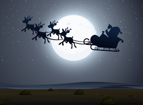 Silhouette scene wtih Santa on the sleigh at night time
