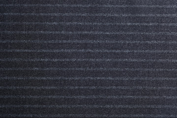 Texture of dark striped fabric as background, closeup
