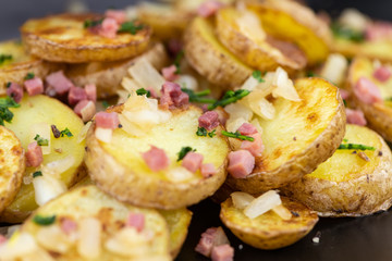 Fried Potatoes on a wooden table (selective focus)