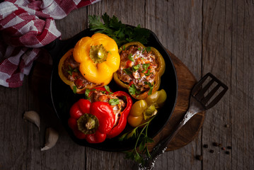 Bell peppers of different colors stuffed with meat