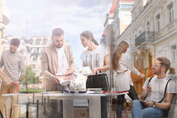 Double exposure of fashion designers and city