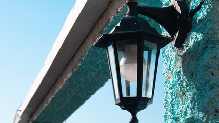 Old lantern as street lighting during a sunny day - Rose Village, Kotor Bay, Montenegro, Europe.