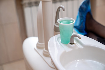 liquid for rinsing oral cavity. dental treatment