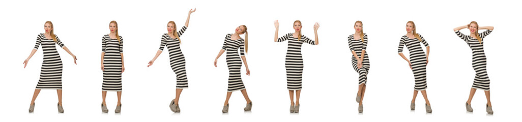 Fototapeta premium Young woman in long striped dress isolated on white