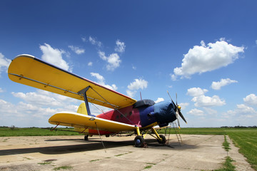 Fototapeta na wymiar Crop duster airplane on airfield