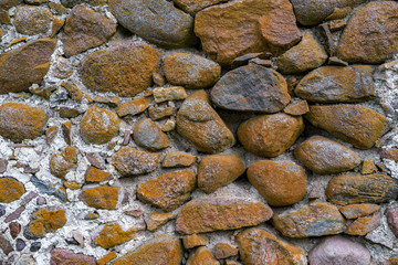 surface of an old wall of huge stones of a destroyed building