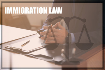 Lawyer at table in office, closeup. Immigration law concept