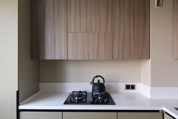 Kitchen interior design in brown and khaki colors