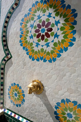 Decorated fountain with mosaic tiles in Essaouira, Morocco.