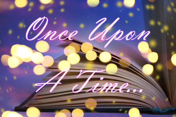 Open book of fairy tales and text Once upon a time