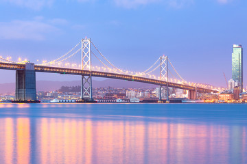 An illuminated view san francisco–oakland bay bridge at dawn, San Francisco, California, United States