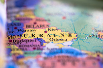 Geographical map location of country Ukraine in Europe continent on atlas - obrazy, fototapety, plakaty