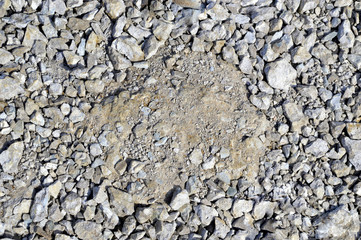 Background made of stones with round space for text in the middle