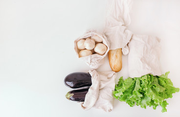 the baguette, the salad, mushrooms and eggplants on the table
