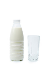 Full bottle of milk and an empty glass isolated on a white background