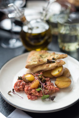 Beef Tartare with Egg Yolk, Fish Roe and Fried Potatoes