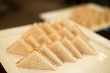 Hotel Coffee break  cold cut platter ham cheese sandwich triangles