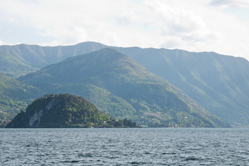 Fototapeta na wymiar Panoramic view on lake. Details of a portion of Como lake.