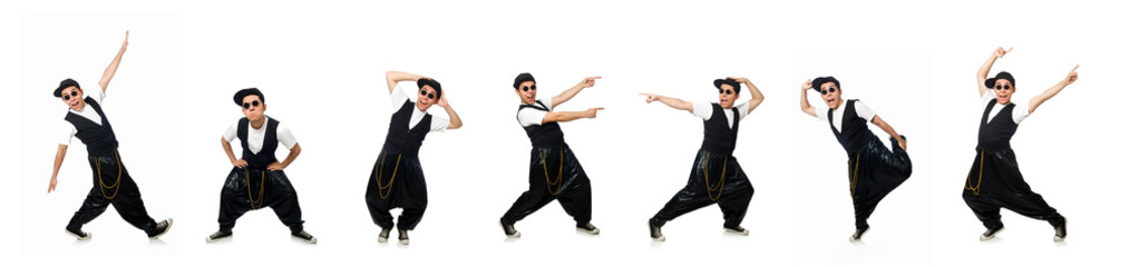 Fototapeta na wymiar Funny young man dancing isolated on white